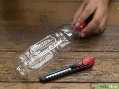 Image titled Make a Puppet with an Empty Bottle and a Broom Stick Step 3