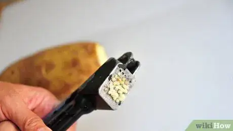 Image titled Easily Clean a Garlic Press Step 8