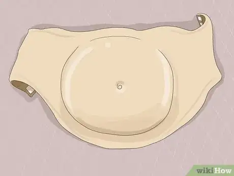 Image titled Look Pregnant Step 4