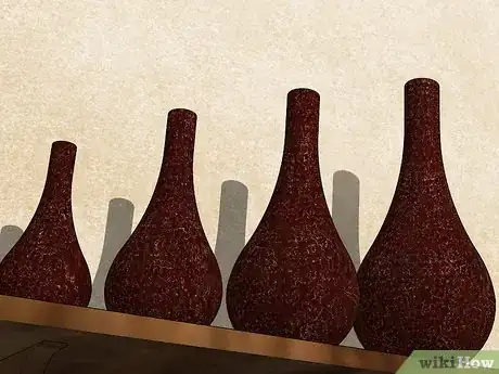 Image titled Decorate a Shelf in the Living Room Step 3