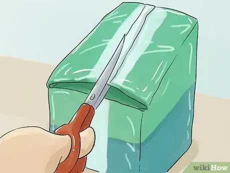 Image titled Use a Disposable Waterproof Underpad Step 1