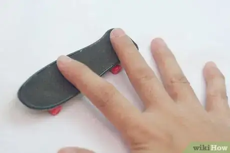 Image titled Do a Truckstand on a Tech Deck Step 2