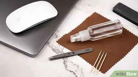 Image titled Clean Gunk Off of an Optical Computer Mouse Step 1