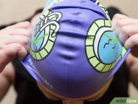 Image titled Put on a Swim Cap Step 4