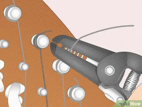 Image titled Change a Harp String Step 12