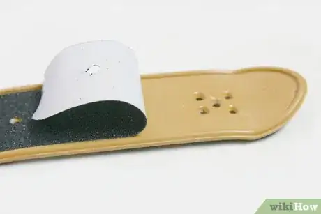Image titled Take Griptape Off of a Tech Deck Step 10