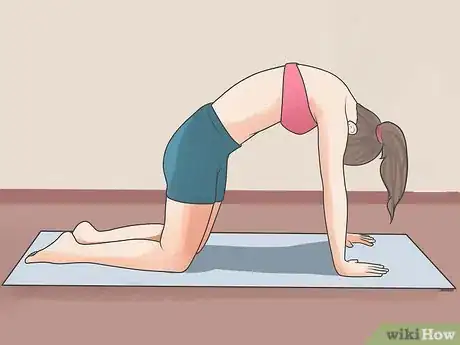 Image titled Stretch Your Back Step 1