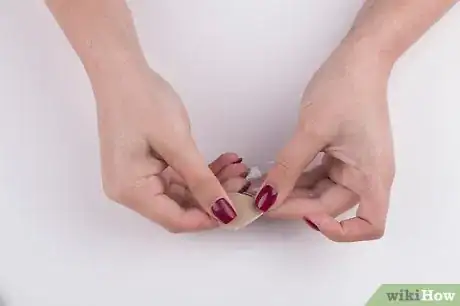 Image titled Make Guitar Picks From Cardboard Step 9