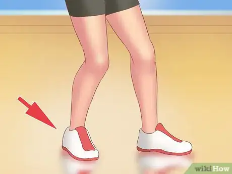 Image titled Do an Underhand Serve Step 1