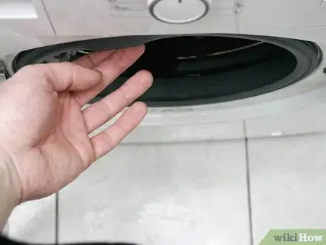 Image titled Stop the Moldy Smell in Clothes from a Front Loader Washing Machine Step 1