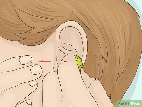 Image titled Keep Earbuds from Falling Out of Your Ears Step 2
