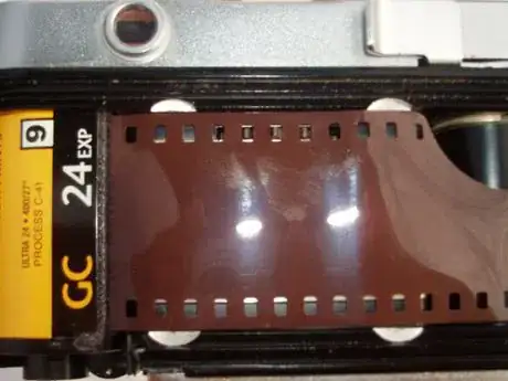 Image titled Film_perforations_engaging_sprocket_nicely_611