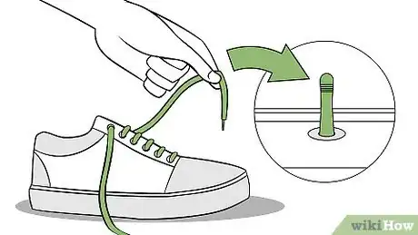 Image titled Retrieve Keys Locked Inside a Car with a Pull Up Lock Step 1