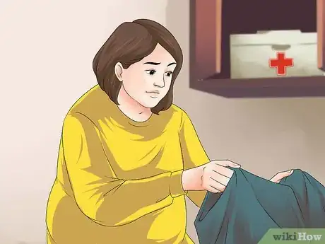 Image titled Deal With Getting a Period Home Alone Step 6