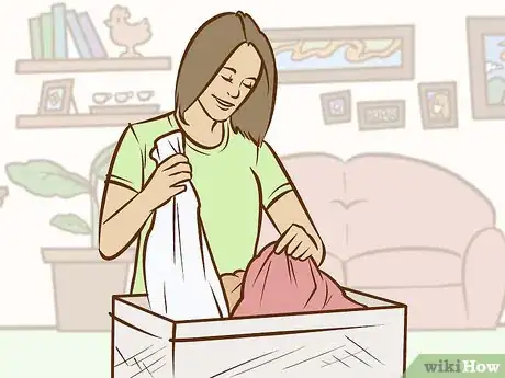 Image titled Remove Coloring Washed in to Clothes Step 2