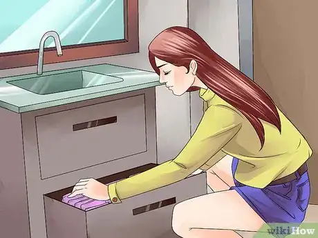 Image titled Deal With Getting a Period Home Alone Step 1
