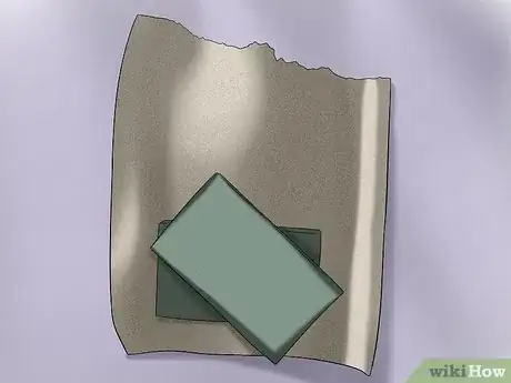 Image titled Clean and Buff a Horse's Hooves Step 1