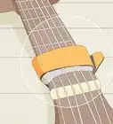 Reduce Guitar String Noise
