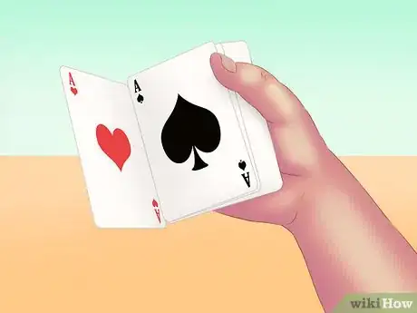 Image titled Make a Card Fall Through a Table Step 11