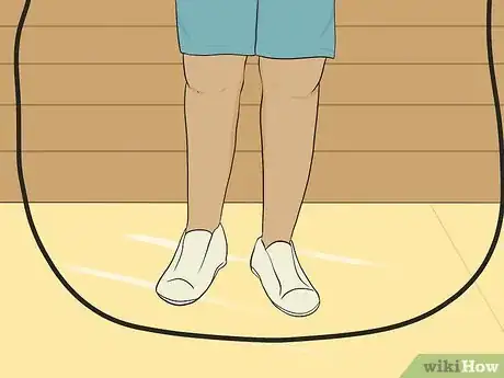 Image titled Teach Someone to Jump Rope Step 2.jpeg