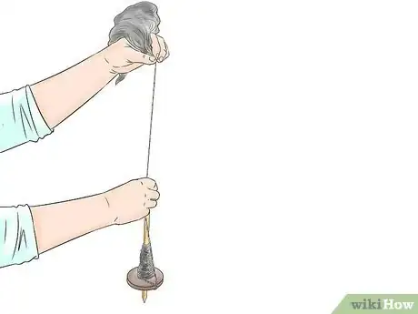 Image titled Spin with a Drop Spindle Step 1