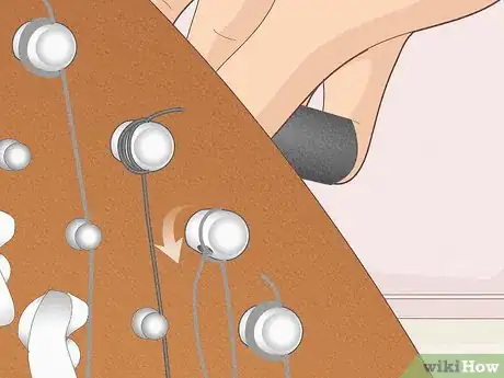 Image titled Change a Harp String Step 10