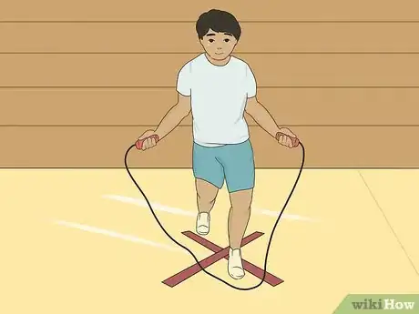 Image titled Teach Someone to Jump Rope Step 7.jpeg