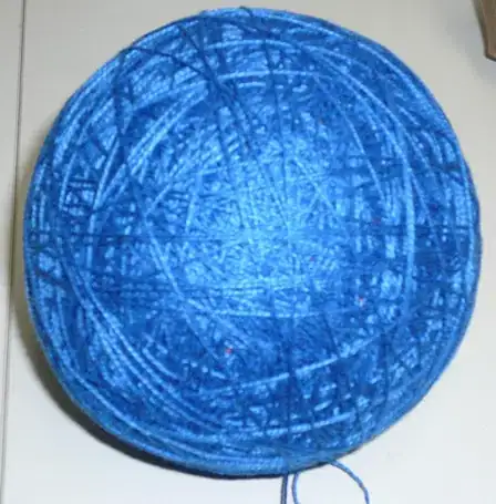 Image titled Cover the ball by randomly wrapping the string around it.