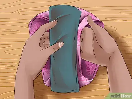 Image titled Deal With Getting a Period Home Alone Step 8