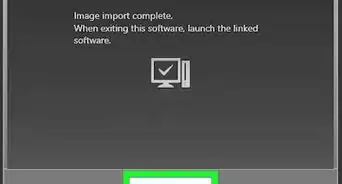 Load Pictures from a Canon Camera to a PC Using Camerawindow