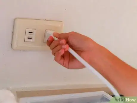 Image titled Curl Your Hair with Tongs Step 8