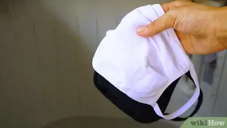 Image titled Properly Clean a Cloth Mask Step 1