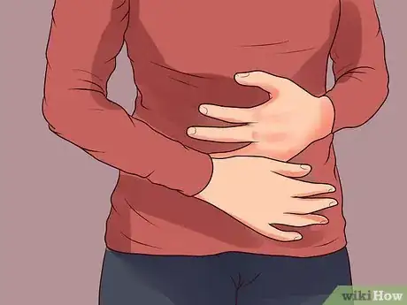 Image titled Identify Female Heart Attack Symptoms Step 7
