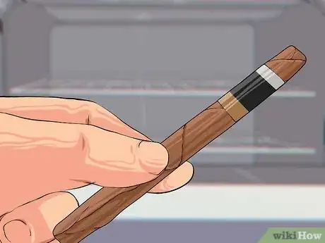 Image titled Remove a Cigarillo Filter Step 1