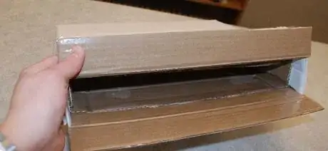 Image titled Secure the inner box with strips of tape going the entire width of the box.