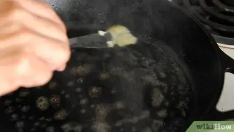 Image titled Flip an Egg Without Using a Spatula Step 2