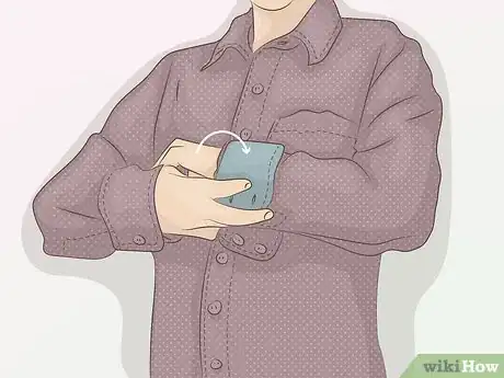 Image titled Roll Up Shirt Sleeves Step 2