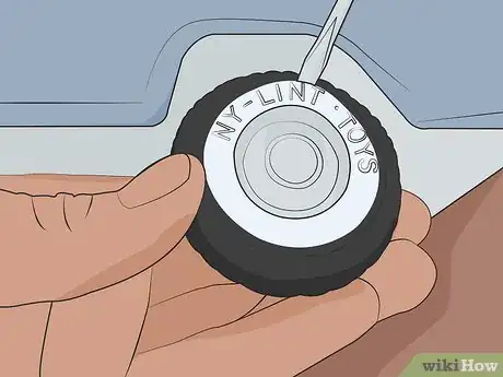 Image titled Remove Nylint Wheels Step 02