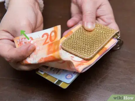 Image titled Fold Money for a Money Clip Step 7
