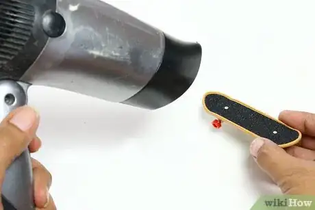 Image titled Take Griptape Off of a Tech Deck Step 3