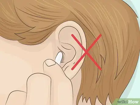 Image titled Keep Earbuds from Falling Out of Your Ears Step 5
