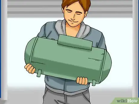 Image titled Make a Wood Burning Heater from an Air Compressor Tank Step 1