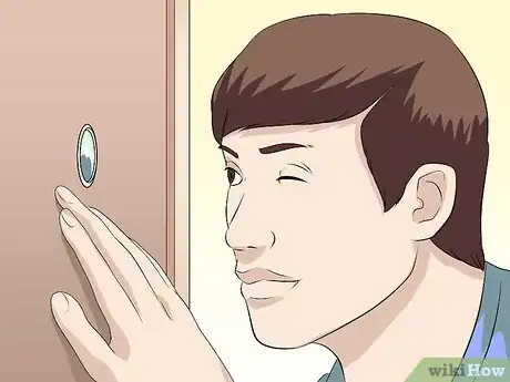 Image titled Answer the Door Safely Step 2