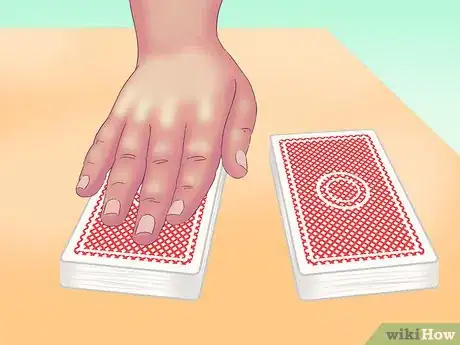 Image titled Make a Card Fall Through a Table Step 15