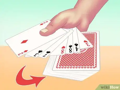 Image titled Make a Card Fall Through a Table Step 14