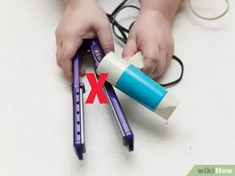 Image titled Style Curly Bangs Step 1