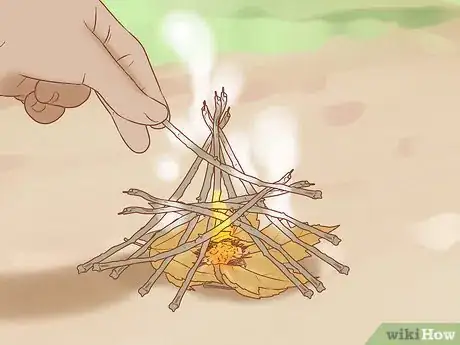 Image titled Use an Emergency Fire Starter Step 11