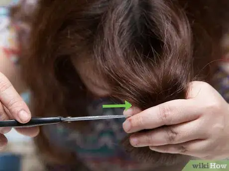 Image titled Style Curly Bangs Step 2