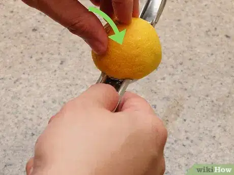 Image titled Use a Citrus Squeezer Step 5