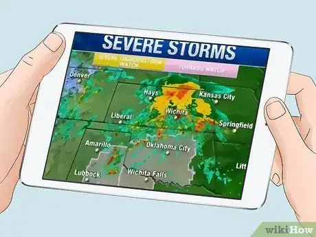 Image titled Stay Safe During a Lightning Storm Step 2